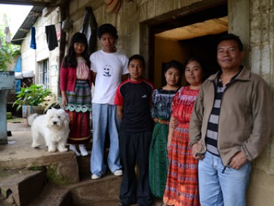 family outside home in Guatemala