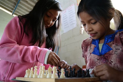 girls playing chess