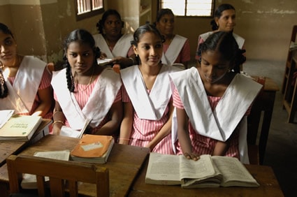 Several girls in a classroom