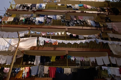 housing development with laundry hanging out on every floor