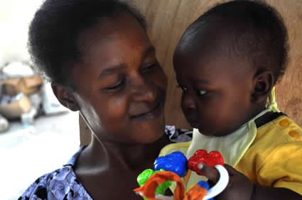 woman holding baby