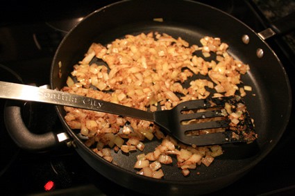 sauteed garlic and onions in a frying pan