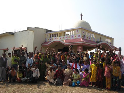 large group of people waving