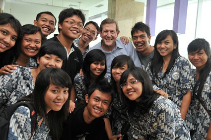 Wess Stafford with a group of students