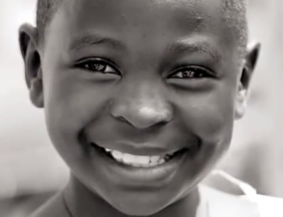 Young child smiling.