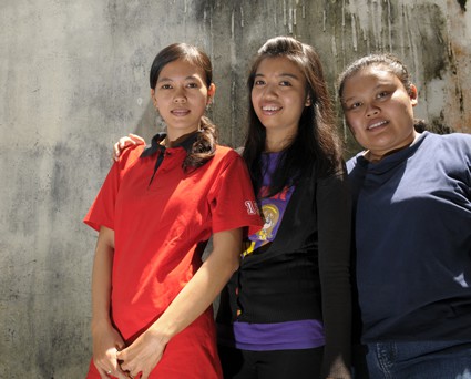 three girls smiling