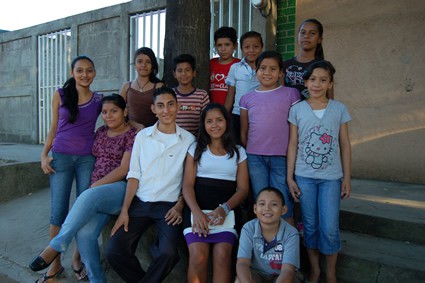 large group of children posing for photo