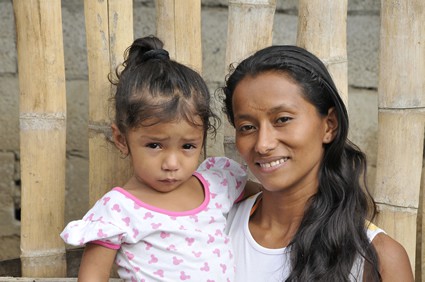 woman holding little girl