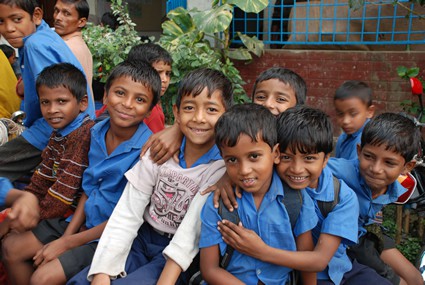 group of boys hugging and smiling