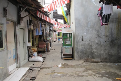 child in an alley