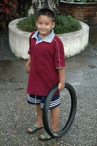 boy with tire