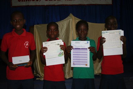 children holding letters