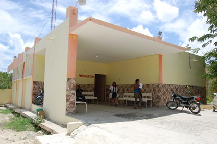 people standing outside of a clinic