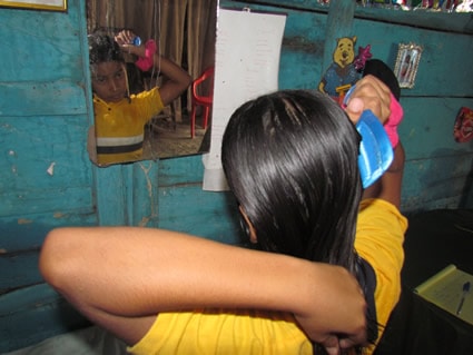 girl brushing hair