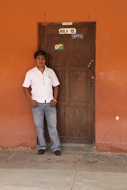 boy standing by door