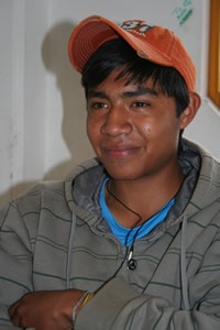 youth wearing orange hat