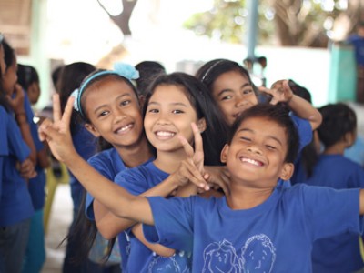 Filipino children smiling for camera