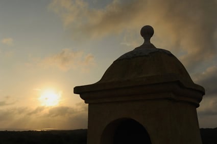 roof of building with sunset