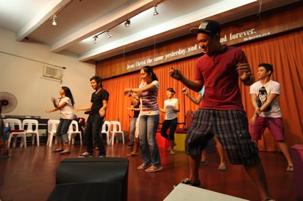 teens practicing a dance
