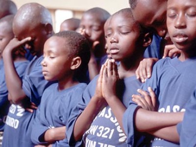 group of children praying