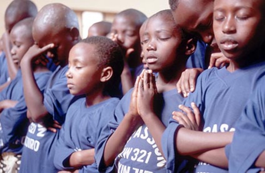 group of children praying