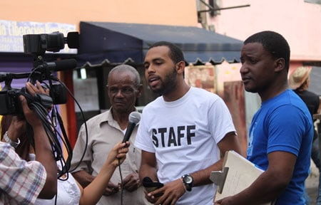 group of men being interviewed on camera