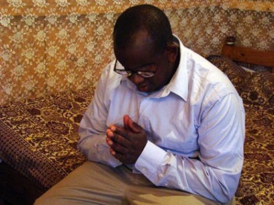 A man praying.