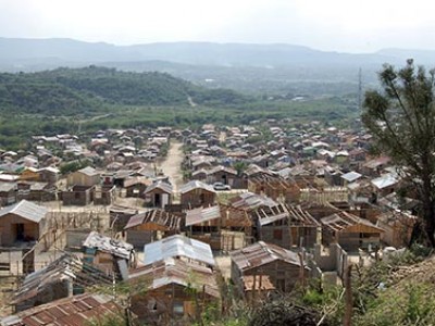 A view of housetops from a hill