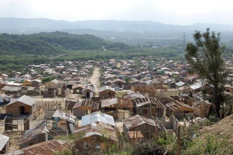 A view of housetops from a hill