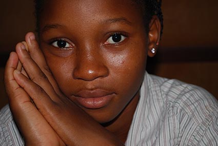 Young child looking at the camera.