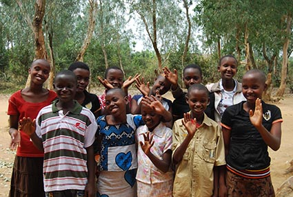 group of children waving