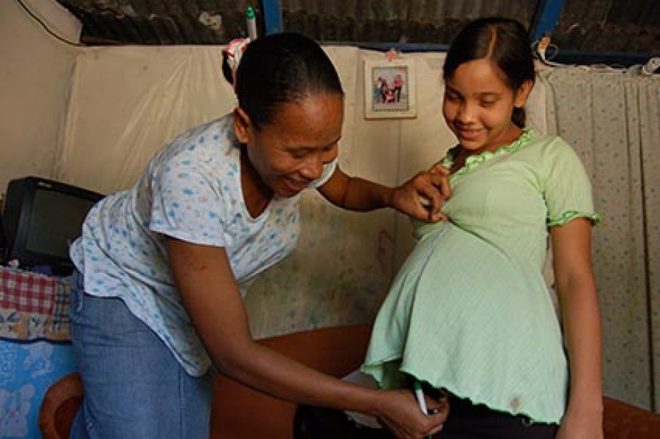 pregnant woman being measured