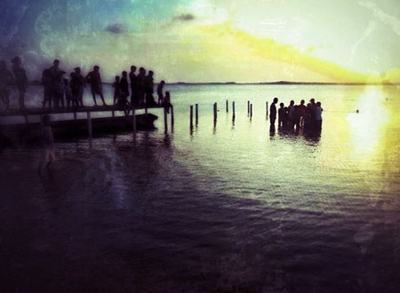 silhouette of outdoor baptism