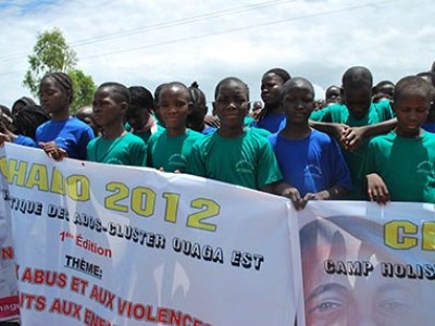 group of children holding banners