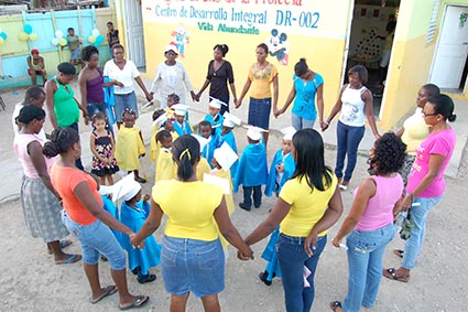 women holding hands in a circle