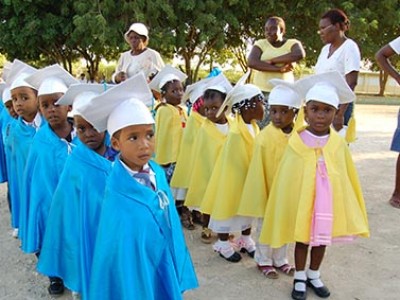young children dressed for graduation celebration