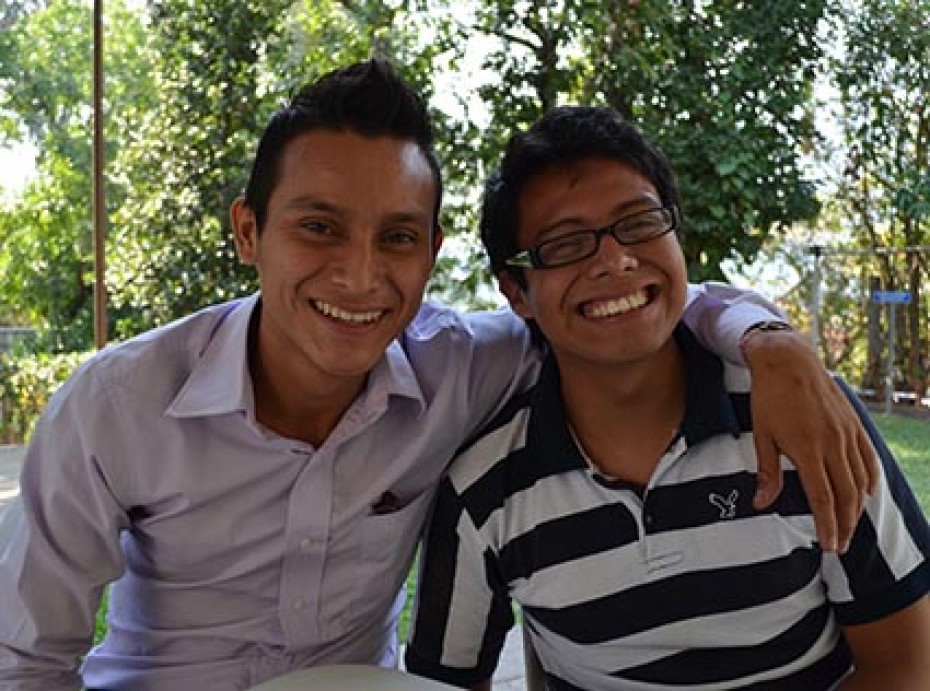 two smiling young men