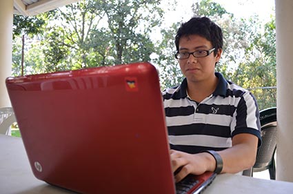 young man working on a laptop