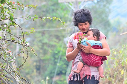 A man holding a baby