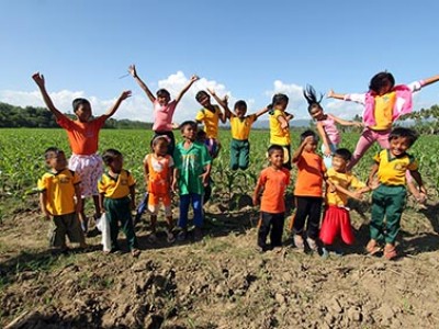 group of children jumping in air