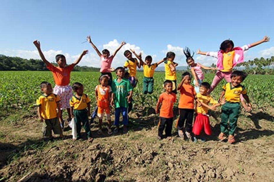 group of children jumping in air