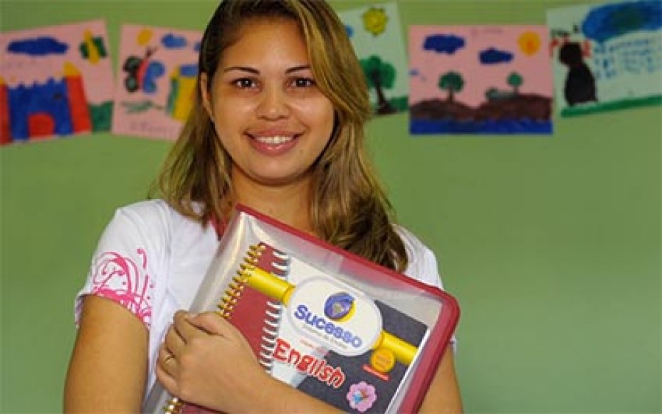 A young student holding a binder