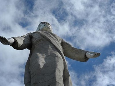 statue of Jesus with outstretched arms
