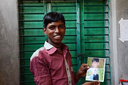 boy holding a photo