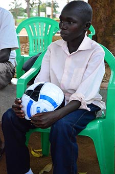 boy holding soccer ball