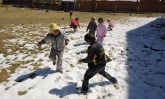 children playing in snow