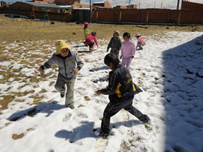 children playing in snow