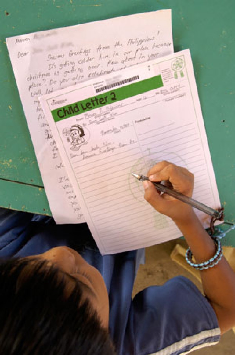 child writing letter