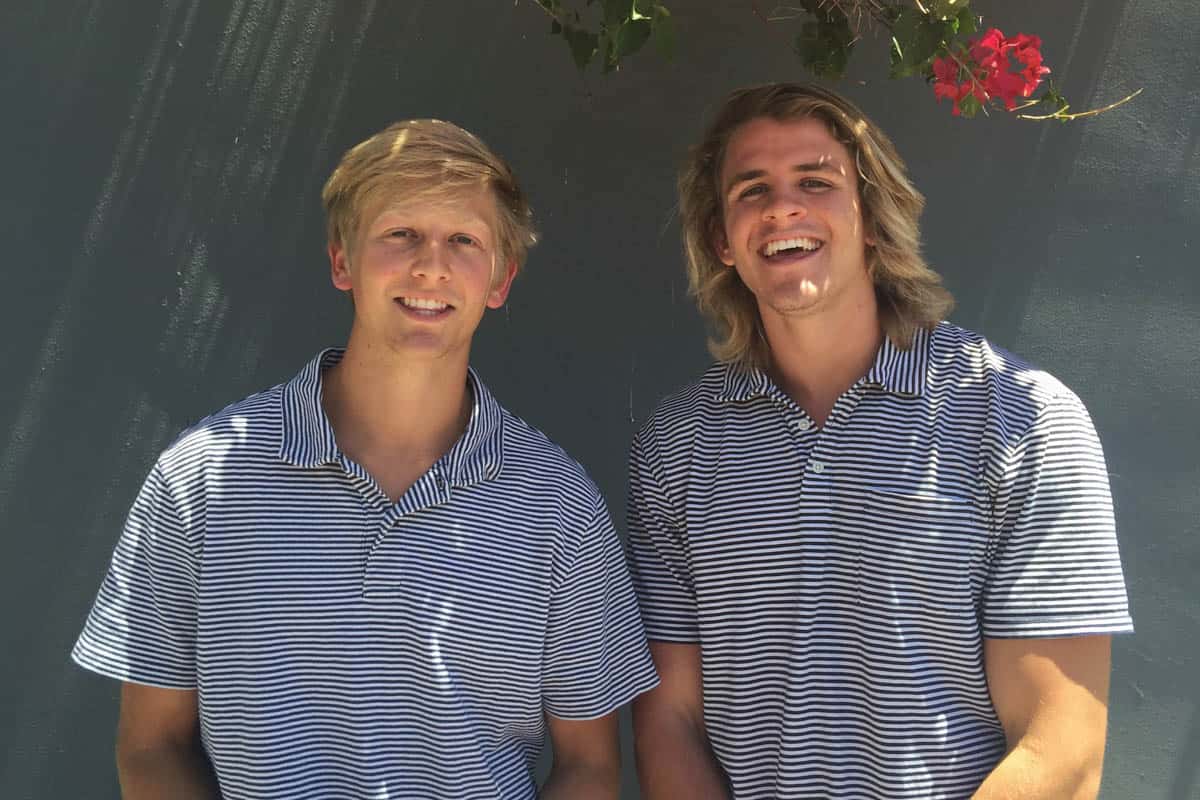 Two young men, Cole LaBrant and John Grice, smile at the camera