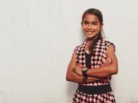 girl standing with arms crossed